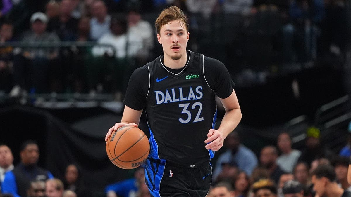 Dallas Mavericks forward Cooper Flagg dribbling basketball during game