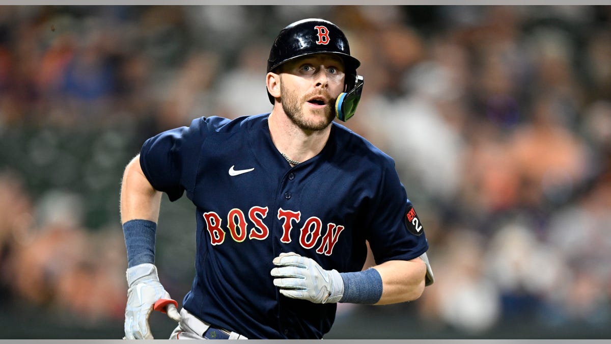 Trevor Story running to first base at Oriole Park at Camden Yards