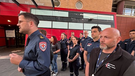 Ambulance Victoria CEO Jordan Emery addressed the media with union secretary Danny Hill (right) and other paramedics on Thursday.