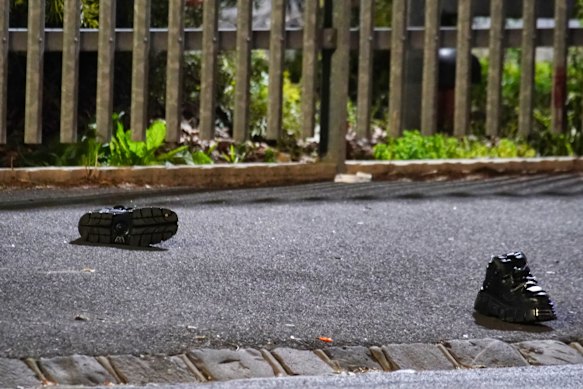 The boots of one of the victims were strewn across the footpath.