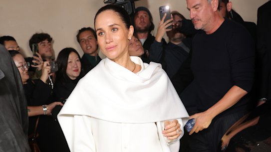 Meghan, the Duchess of Sussex, wearing Balenciaga at Paris Fashion Week in October.