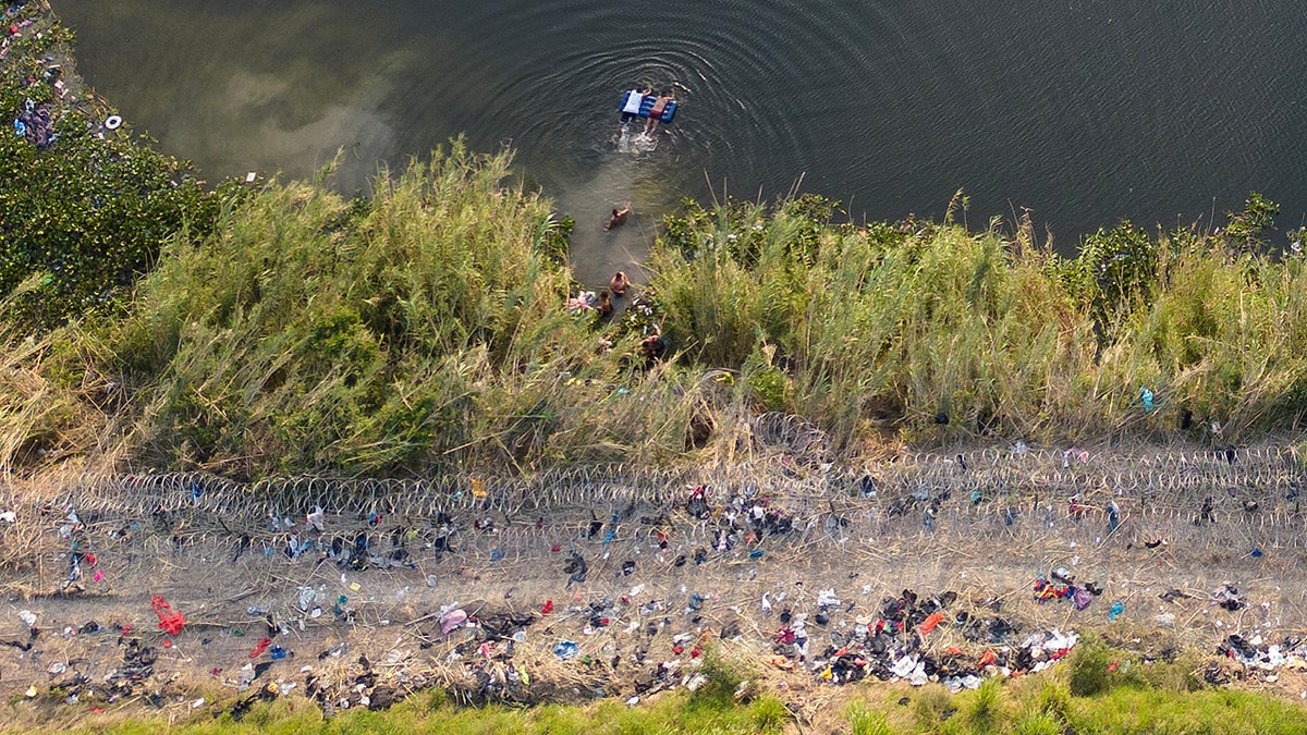 People returning to Mexican side of Rio Grande river in Brownsville Texas