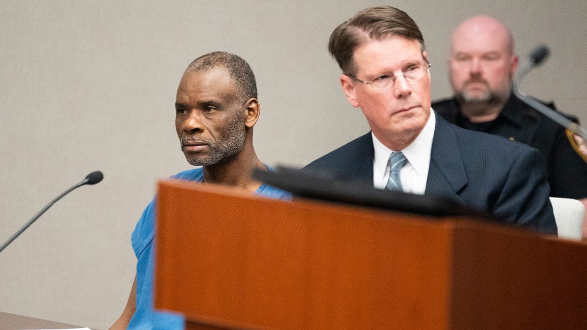 Modou Ngom sitting in cout