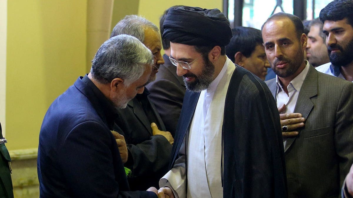 Soleimani greeting Khamenei the younger