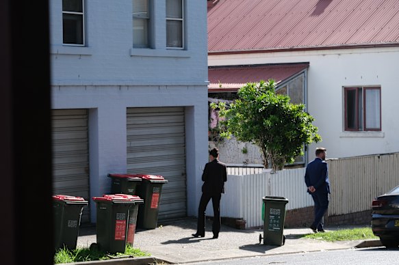 Detectives In Balmain on Friday morning. Graham’s relative remains in a critical condition in hospital after her alleged attack caused a seizure and stopped his breathing.