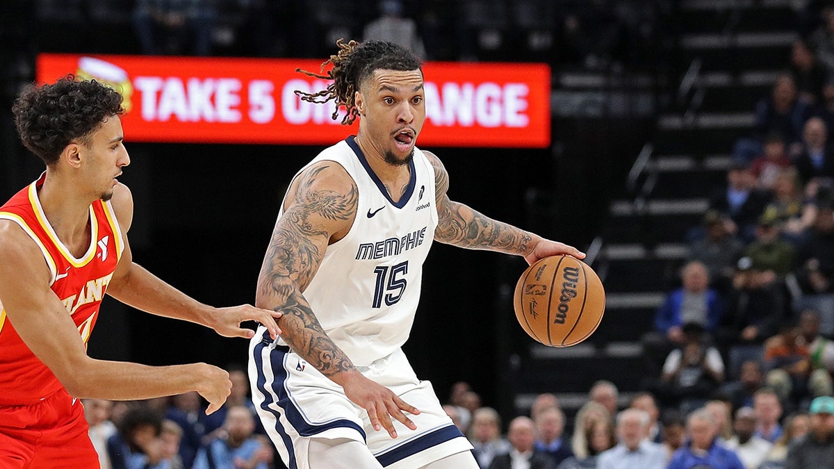 Brandon Clarke dribbles