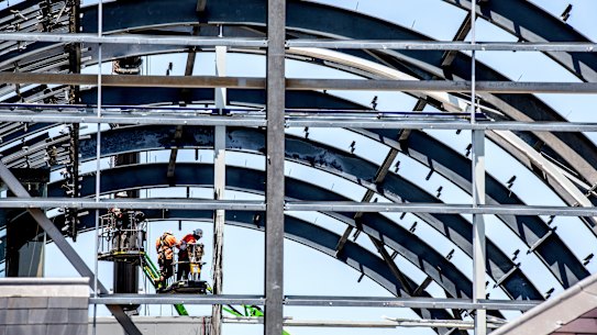 The steel ribs are exposed as the Wran Building is demolished. 
