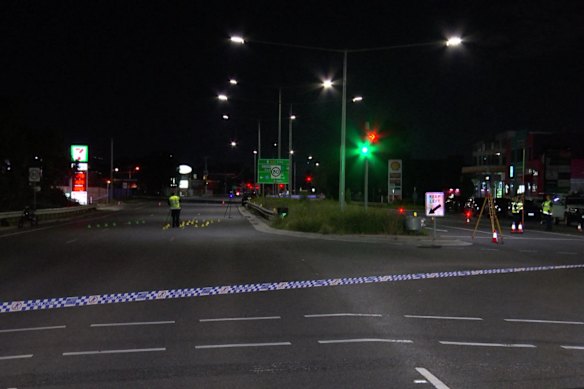 Police tape across the road where a fatal e-bike crash occurred.