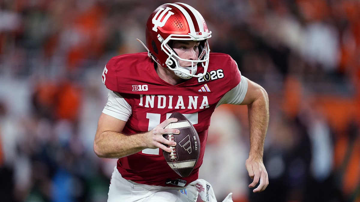 Fernando Mendoza looks to pass