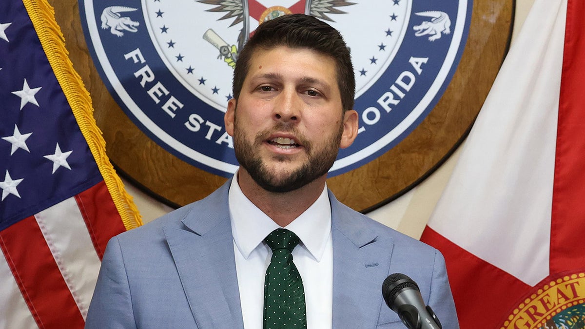 James Uthmeier at a news conference