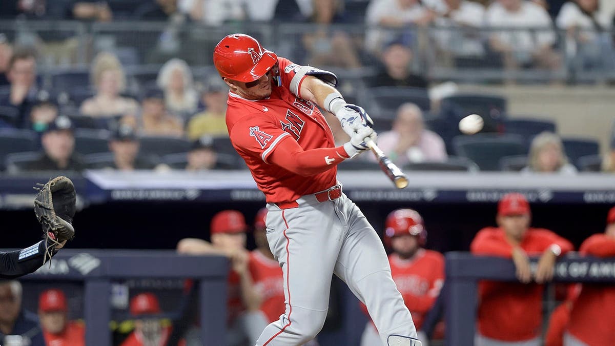 Mike Trout hitting a three-run home run at Yankee Stadium