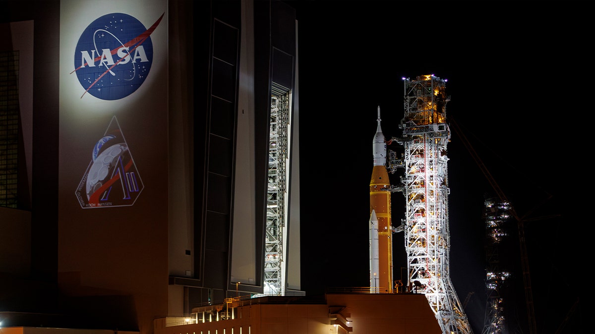 The Artemis 2 Space Launch System rocket rolling to Launch Complex 39 Pad B at Kennedy Space Center
