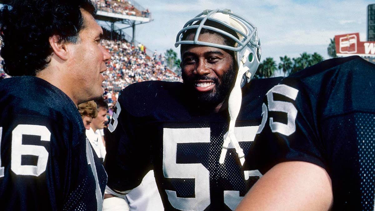 Los Angeles Raiders linebacker Rod Martin standing on the sideline at the Orange Bowl