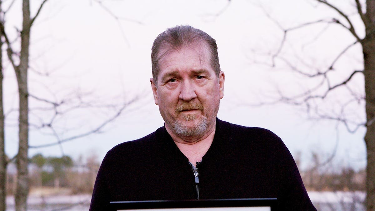 Tim Jones Sr posing for a portrait photograph.