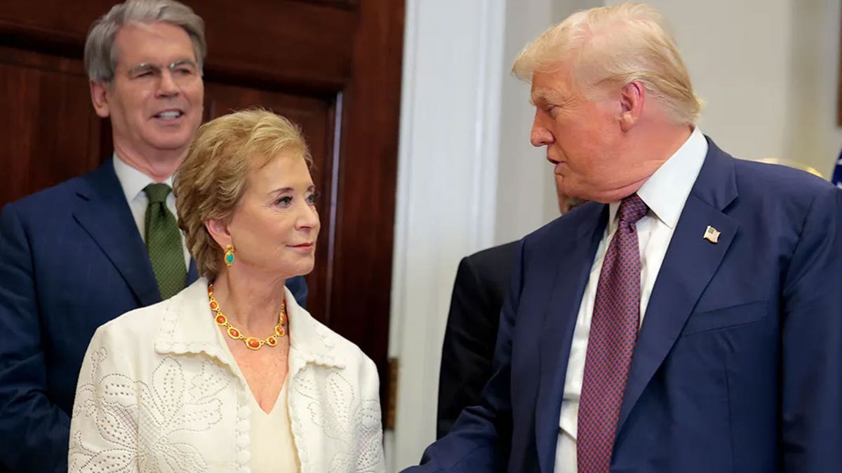 President Donald Trump speaking with Secretary of Education Linda McMahon in the White House Roosevelt Room
