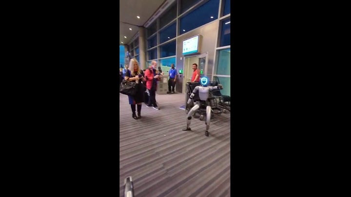 Dancing robot steals show at airport gate, briefly delays departing flight