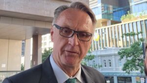Charges dropped against Olympian Neil Brooks and wife Linda Brooks in $2m fraud case