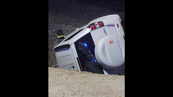 A Suzuki Grand Vitara crashed and rolled down an embankment after allegedly narrowly avoiding a freight train in Midvale.