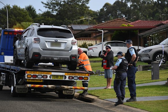 A grey vehicle was taken from the scene in Rosemeadow on Sunday morning.