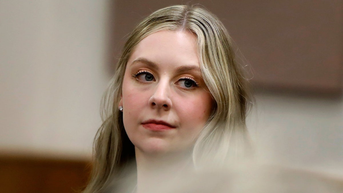 Abby Zwerner looking back in a courtroom during a trial