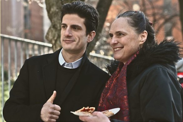 Jack Schlossberg, grandson of JFK, poses with a nurse on a strike picket line in New York City in January.
