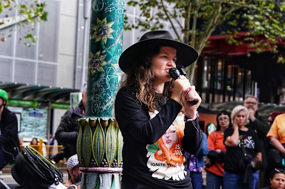 Isla Bell’s mother, Justine, speaks at the rally on Saturday.