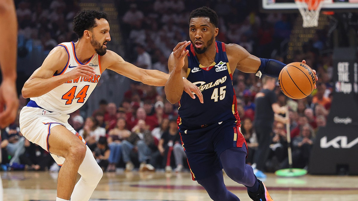 Donovan Mitchell dribbles during a game