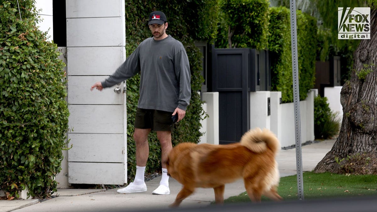 Hasan Piker standing outside his West Hollywood home