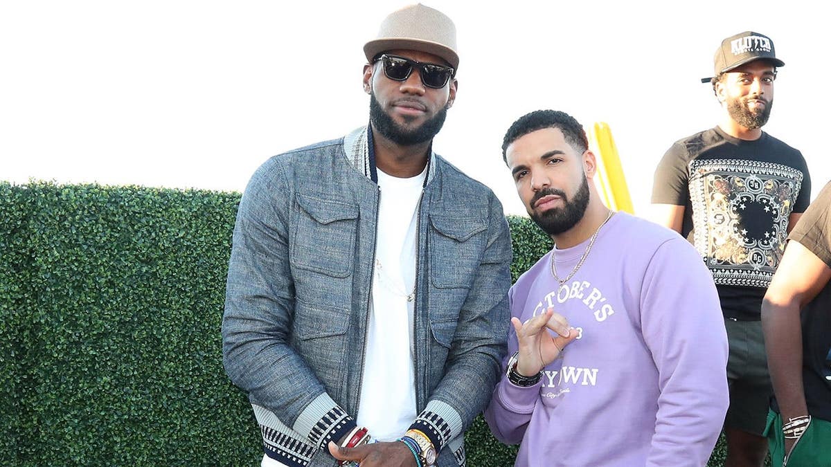 LeBron James and Drake standing together at a pool party in Toronto.