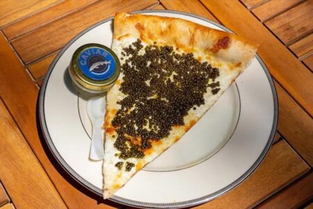 Philadelphia pizza shop sells $55 slices topped with caviar, served on gold plate with keepsake spoon