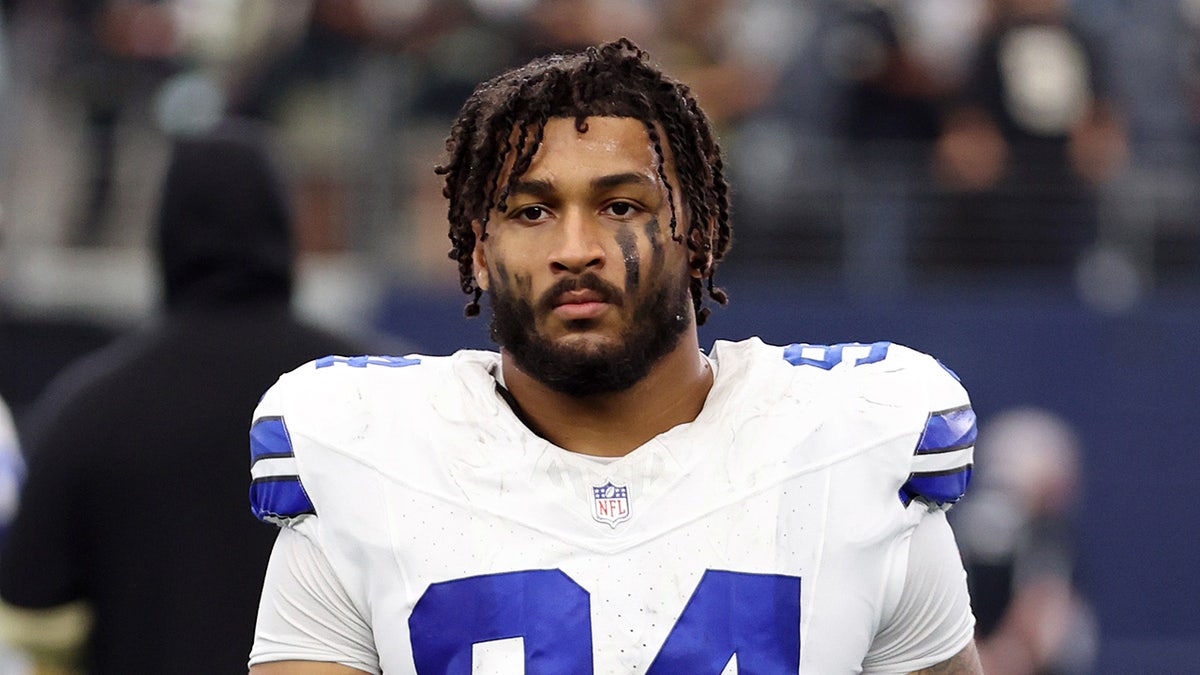 Dallas Cowboys defensive end Marshawn Kneeland walking off the field at AT&T Stadium