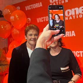 Fans pose for selfies with Pauline Hanson at a One Nation fundraiser.