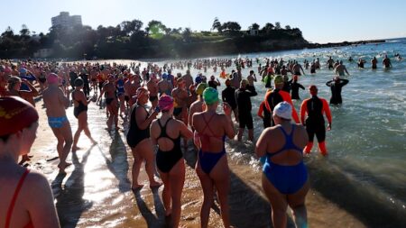 Community returns to the ocean in honour of attack victim