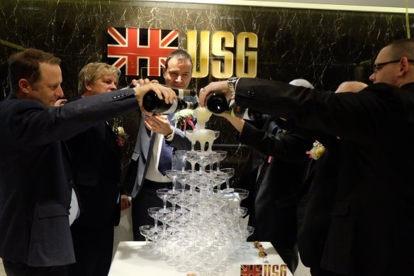USGFX’s Hong Kong launch in 2018. From left: Shuriken’s Andrew Jeffers, USG director John Martin, USG chief executive Shay Zakhaim. Justice Wigney awarded a $131 million fine against the group on Thursday.