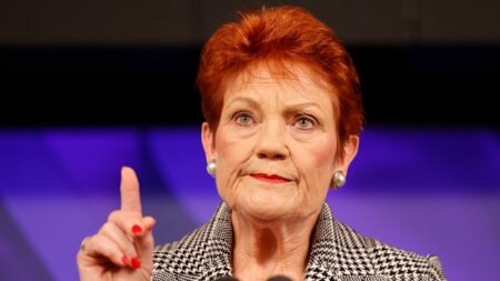 Pauline Hanson National Press Club banner stunt referred to AFP; Vodafone outage reported; US-Iran peace deal details revealed