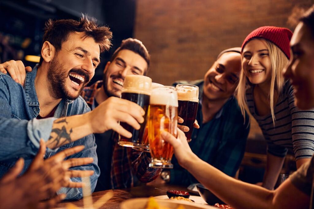 Drinking alcohol may influence cravings for certain foods in a surprising way, study suggests
