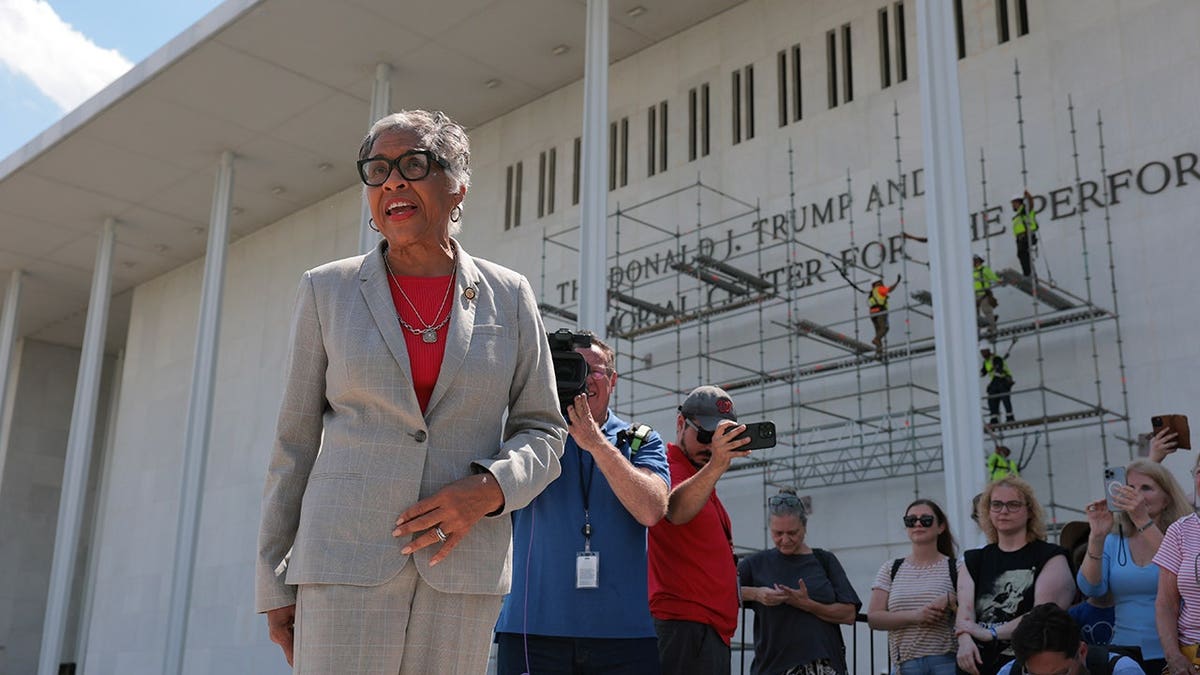 Rep. Joyce Beatty speaking near scaffolding at the Kennedy Center in Washington, D.C.