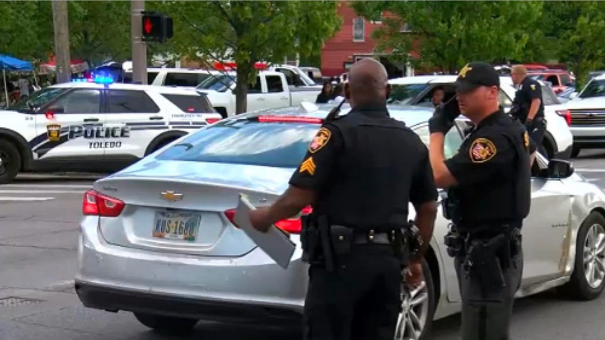 A large police presence remained in the area on June 6, 2026, as officers searched for those responsible for the shooting near the Old West End Festival in Toledo, Ohio.