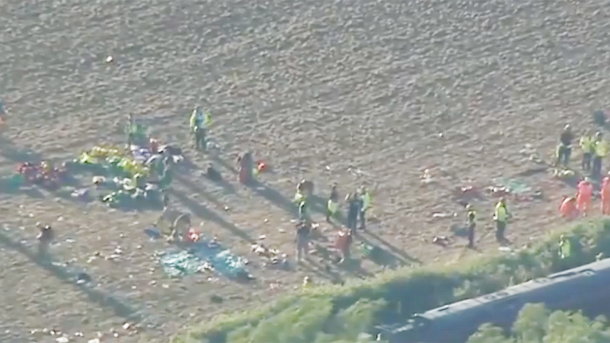 Emergency crews were pictured working near the scene.
