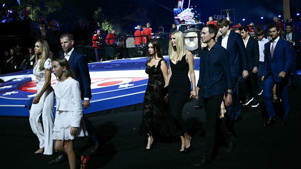 Lara Trump, Carolina Trump, Eric Trump, Arabella Rose Kushner, Ivanka Trump, Jared Kushner, Tiffany Trump, Barron Trump and Michael Boulos walking on the South Lawn of the White House in Washington, D.C.