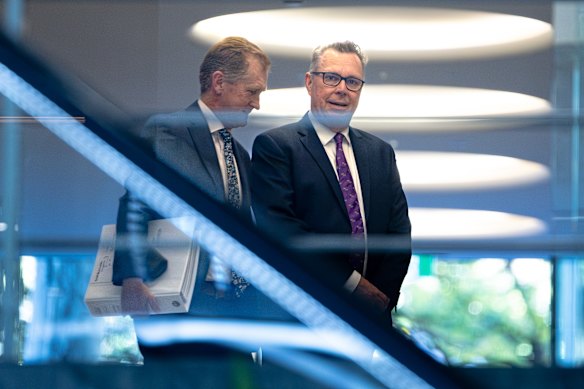 Former interim University of Wollongong vice chancellor Professor John Dewar (right) appeared at the inquiry.