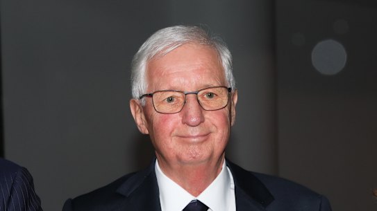 Former University of Wollongong chancellor Michael Still leaves the Independent Commission Against Corruption on Monday.