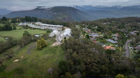 Status lifted one day after housing proposal fast-tracked