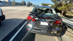 Unsecured metal pipes impale California sedan in terrifying highway crash