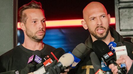 Tate brothers to remain behind bars for now as UK seeks extradition on rape, trafficking charges
