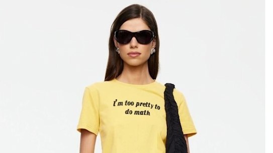 This T-shirt is being sold at Myer with the slogan “I’m too pretty to do math”.
