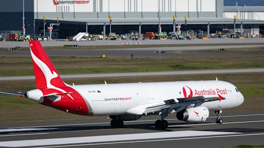 A Qantas cargo aircraft lands at Western Sydney Airport on July 13 as part of trials ahead of the opening of the cargo precinct.