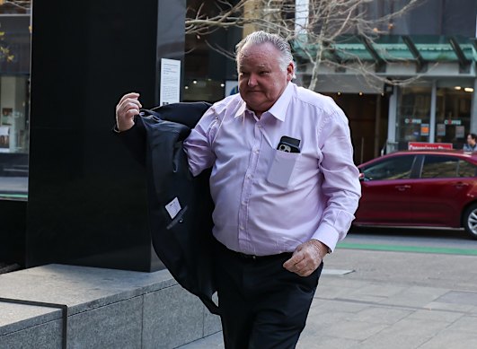 Greg Poland arriving at David Malcolm Justice Centre.