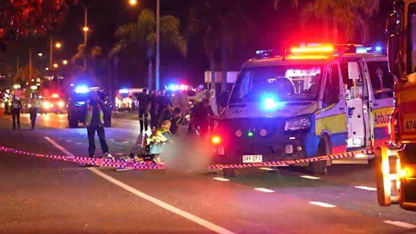 Paramedics attend the fatal crash at Warana, on the Sunshine Coast, on Saturday night.