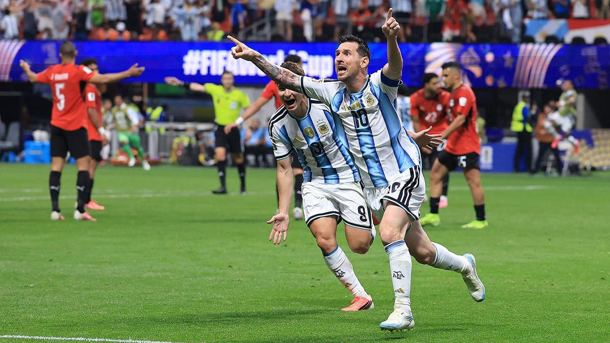 Lionel Messi celebrates after scoring a goal